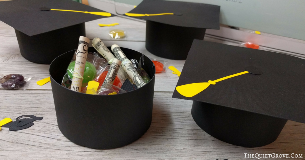 graduation caps filled with candy and money